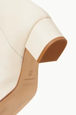 NANCY BOOT | CREAM 16 NANCY BOOT | CREAM -Chic Style Shop STAUD NANCY BOOT CREAM FALL 22 ECOM 4