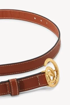 SWIRL BUCKLE BELT | TAN -Chic Style Shop STAUD SWIRL BUCKLE BELT 25MM TAN HOLIDAY 22 ECOM 2