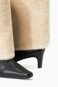 WALLY FOLDOVER BOOT | BLACK CREAM 12 WALLY FOLDOVER BOOT | BLACK CREAM -Chic Style Shop STAUD WALLYFOLDOVERBOOT BLACKCREAM ECOM 5